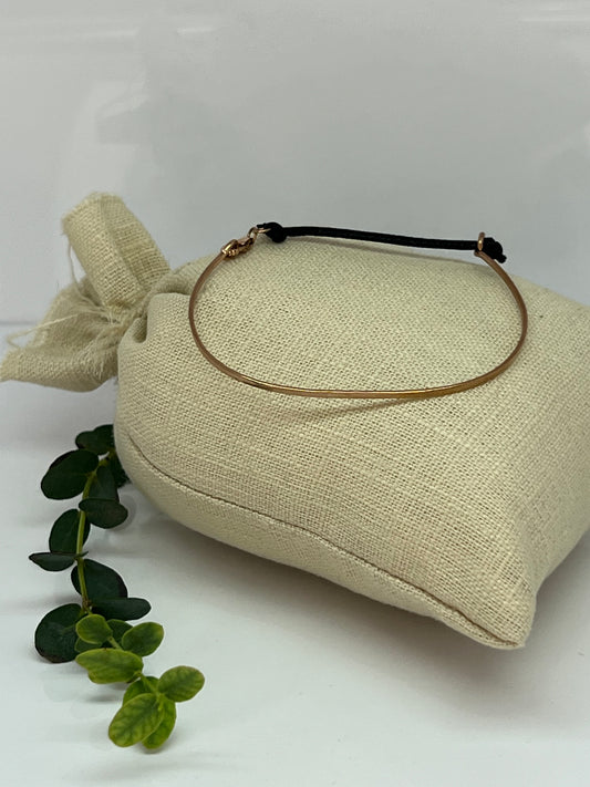 BRACCIALE IN ORO RIGIDO CON LACCETTO DI STOFFA